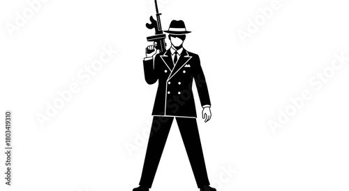 Mysterious man holding a gun in a suit and hat, ready for action