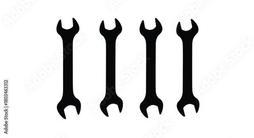 Four black wrench tools for repair and maintenance