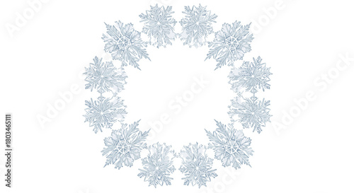 A circular arrangement of delicate, intricate snowflakes against a white background.