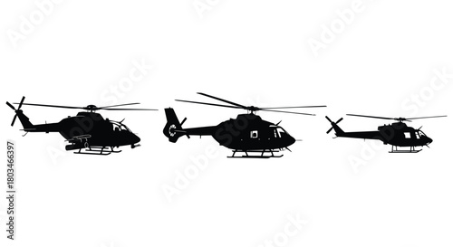 Silhouette of three helicopters in a row