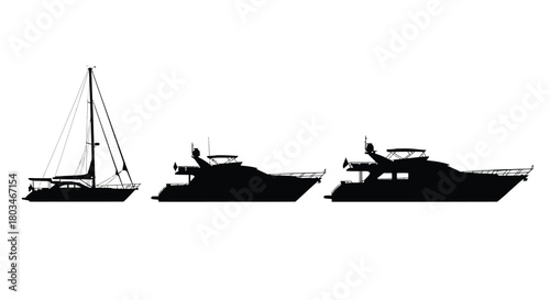 Silhouettes of three different types of boats