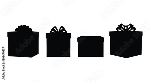 Silhouette of four gift boxes