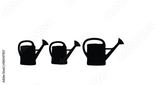 Set of three black watering can