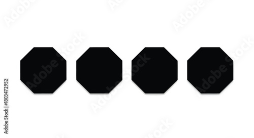 Four black octagon shapes arranged in a row