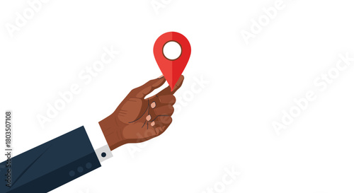 A dark-skinned hand, dressed in a business suit, delicately holds a vibrant red map location pin icon against a plain white background.