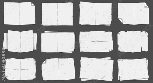 Collection of crumpled and creased white paper sheets, showing texture and wear