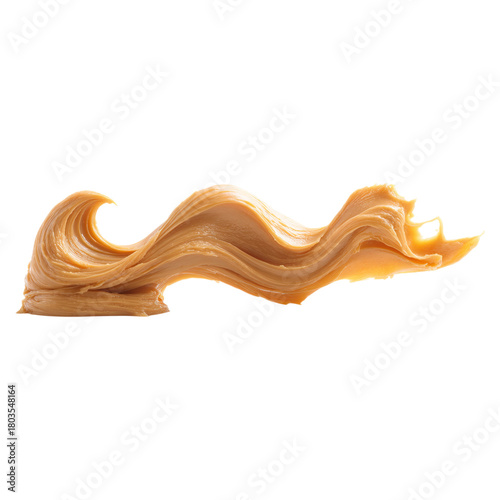 Smooth peanut butter spread on surface concept. Smooth and creamy peanut butter swirled on a surface.