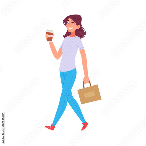 Happy Young Woman Winking While Walking with Coffee and Shopping Bag