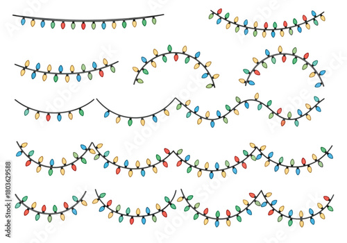 Collection of colorful string lights arranged in various curved and straight lines.