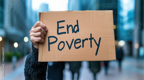 Diverse Group Holds Sign for Ending Poverty at Urban Protest