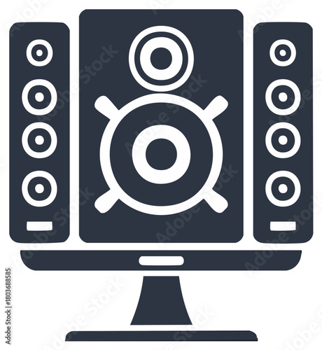 Modern computer monitor with surround sound speakers flanking