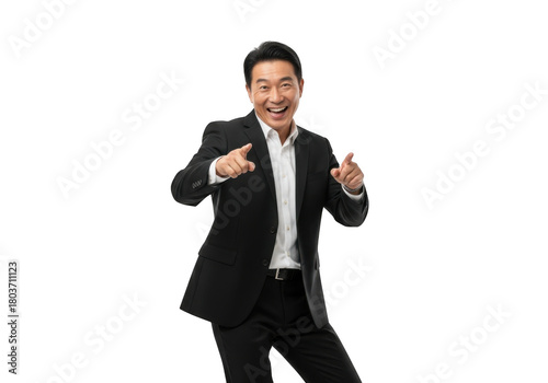 Excited asian businessman in a sharp black suit and white shirt pointing with both index fingers forward isolated on transparent background