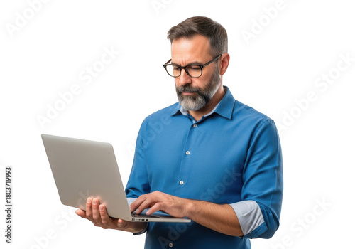 Mature man wearing glasses and blue shirt working on a laptop computer with focused expression isolated on transparent background