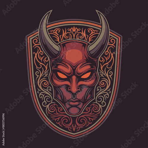 Fierce red devil head with horns in an ornate shield.
