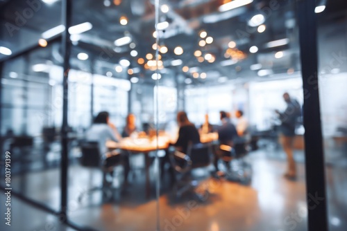 Wallpaper Mural blurred background of a business meeting in a modern office with a glass door and people sitting at a table, a group talking during a conference or meeting. Torontodigital.ca