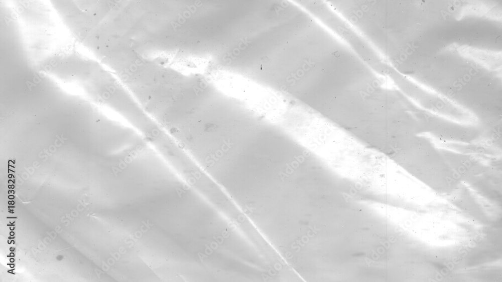 Obraz premium Shiny Wrinkled Transparent Plastic Film Texture, High Contrast Monochromatic White Gray Background, Dust Residue Window Digital Effect