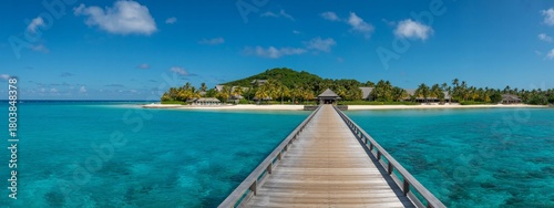 Stunning tropical island paradise awaits with a picturesque wooden pier leading to pristine beaches and luxury resort bungalows under a brilliant blue sky