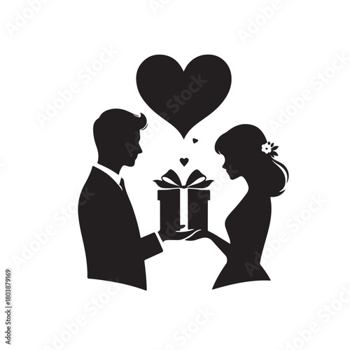 Couple exchanging a gift silhouette