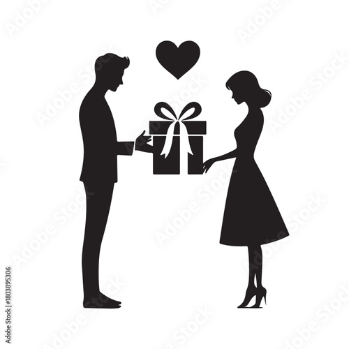 Couple exchanging a gift silhouette