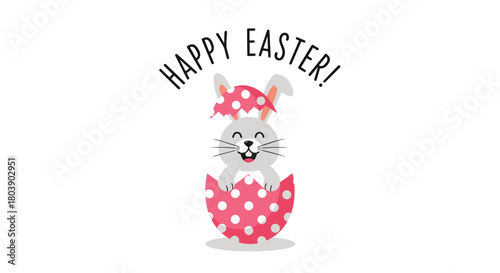 A cute gray bunny with an open mouth and whiskers smiles happily as it peeks out from a cracked pink polka-dotted Easter egg, with \.