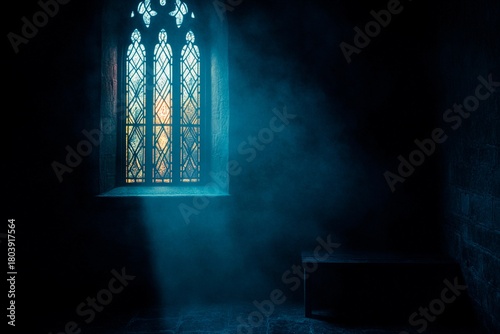 Hazy light shines through a vintage window in an old church wall