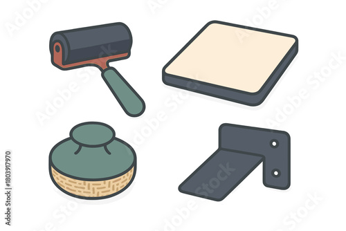 Assortment of printmaking tools including brayer roller, ink pad, and corner jig