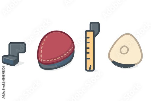 Set of essential sewing and tailoring equipment including measuring tape and pincushion