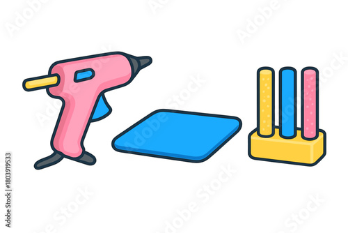 Pink hot glue gun with colorful glue sticks and protective mat for crafting projects