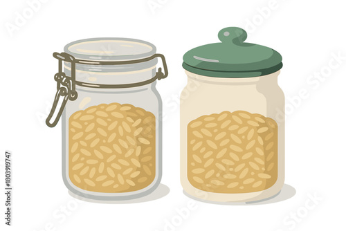 Pair of kitchen storage jars filled with dry cereal grains or seeds