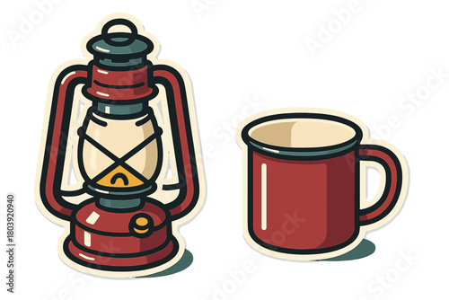 Red kerosene lantern and matching enamel coffee cup, classic camping essentials