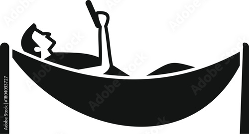 Man lying in hammock using smartphone, enjoying leisure time