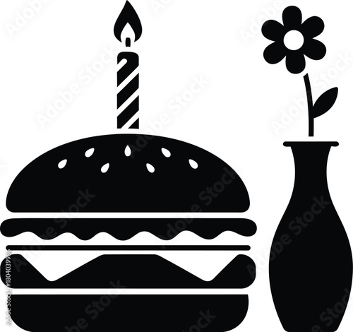 Hamburger birthday cake with candle and flower in a vase