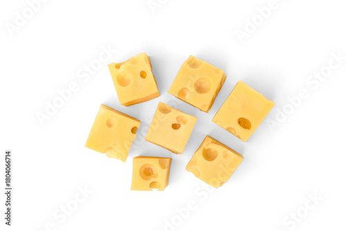 Maasdam cheese cubes isolated on white background.