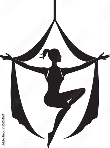 Aerial yoga pose, black silhouette of a woman suspended in a silk hammock