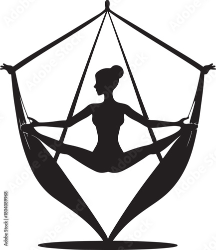 Aerial yoga pose, black silhouette of a woman suspended in a silk hammock