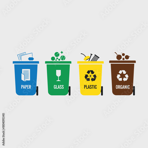 Four colored recycling bins with different waste types.