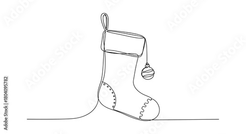 One continuous line drawing of a Christmas stocking with ornament  