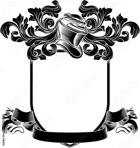Coat of arms crest knight family medieval shield heraldry heraldic armorial motif. Featuring a knights helm helmet in a vintage etching engraving woodcut style