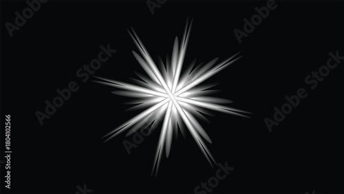 White Starburst Against Black Background