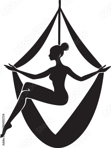 Aerial yoga pose, black silhouette of a woman suspended in a silk hammock