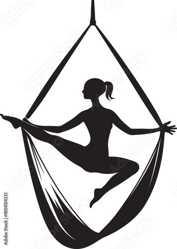 Aerial yoga pose, black silhouette of a woman suspended in a silk hammock