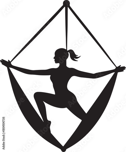 Aerial yoga pose, black silhouette of a woman suspended in a silk hammock