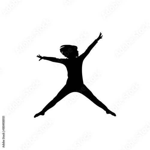 Silhouette of a child jumping with arms and legs outstretched against a white background in a studio shot