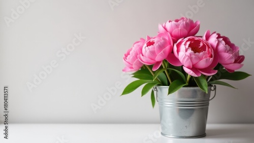 Wallpaper Mural A metal bucket filled with vibrant pink flowers Torontodigital.ca