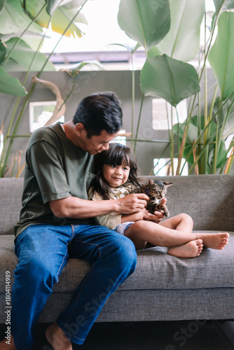 Happy Family Moment with Beloved Pet Cat Indoors