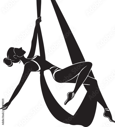 Aerial yoga pose, black silhouette of a woman suspended in a silk hammock
