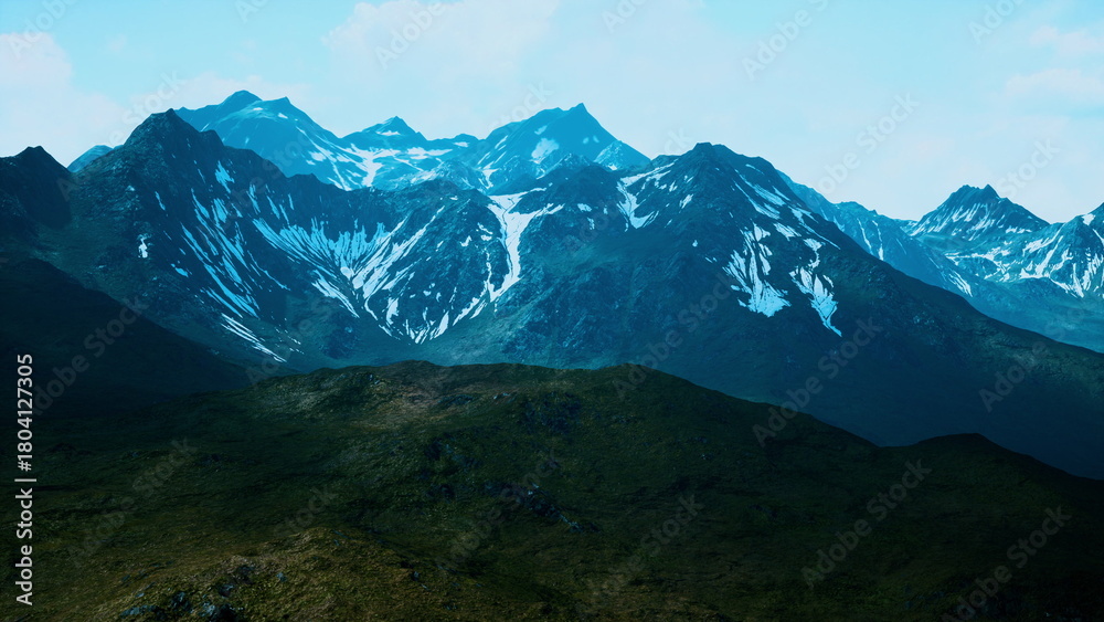Fototapeta premium A breathtaking view of snow capped mountains stretches across the horizon. The sunlight highlights the rugged peaks and the lush green valley below. Nature unfolds in serene silence.