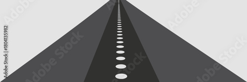 A straight asphalt road with white dotted lane markings stretching into the distance under a gray sky