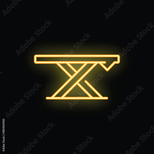 Yellow neon sign of an ironing board glowing on a black background