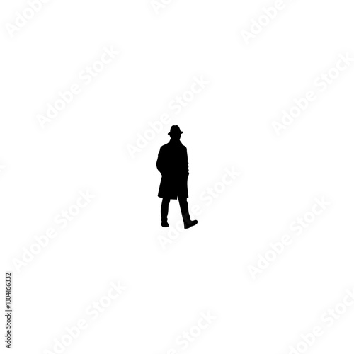 Intriguing silhouette of a mysterious man wearing a hat and coat walking alone in the shadows